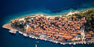 Guiding through the old town center of the city of Rab